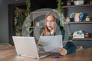 Girl typing on laptop and relaxing