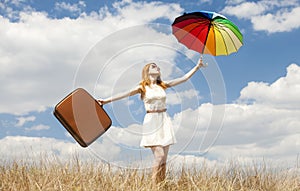 Girl with umbrella at outdoor.