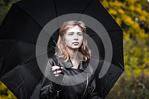 Girl, umbrella and rails