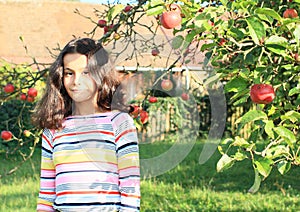 Girl under apple tree