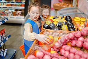 Girl in uniform playing saleswoman, playroom