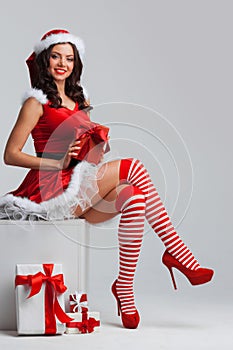 Girl unwrapping christmas present