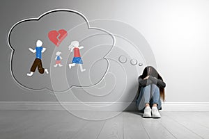 Girl upset because of parents divorce at home. Illustration of broken heart and family