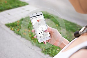 Girl use app and sensor on mobile phone to measure heart rate and SpO2