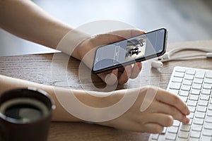 Girl uses phone and computer