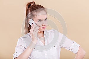 Girl using mobile phone talking