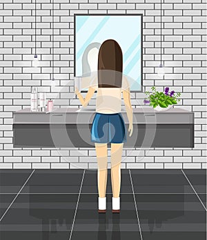 Girl using modern bathroom in the morning