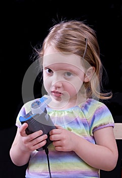 Girl using nebulizer