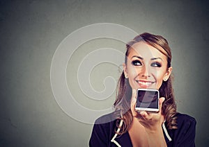 Girl using a smart phone voice recognition function online