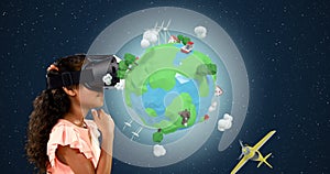 Girl using virtual reality headset with digitally generated travel icons 4k