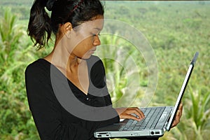 Girl on Vacation Using Laptop Computer Outside