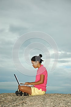 Girl on Vacation Using Laptop Computer Outside