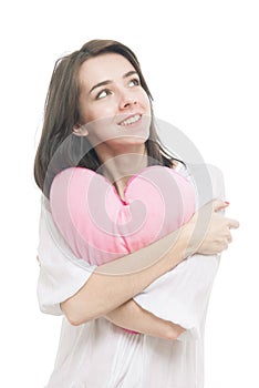 Girl with valentine pink pillow heart photo