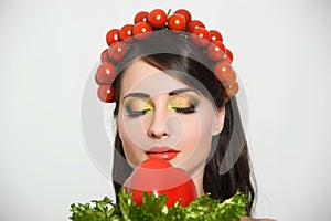 Girl with Vegetables hair style. Beautiful happy young woman with vegetables on her head. Healthy food concept, diet, veget