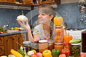 Girl with vegetables and jars photo