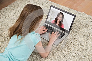 Girl Video Chatting On Laptop