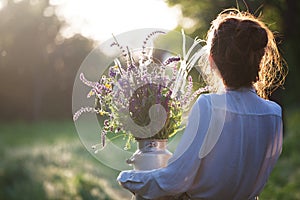 Girl in the village works in the garden