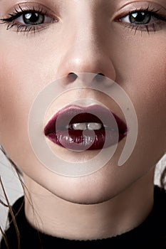 Girl with vinous lips photo