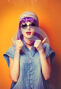 Girl with violet hair in sunglasses