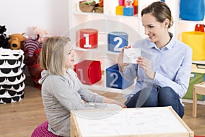 Girl visiting speech therapist