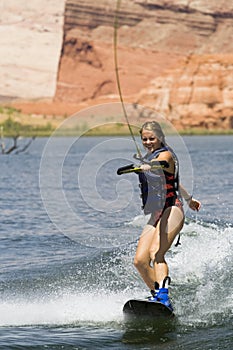 Girl Wakeboarding at Lake Powe