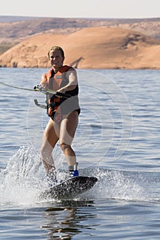 Girl Wakeboarding at Lake Powe