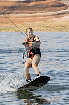 Girl Wakeboarding at Lake Powell