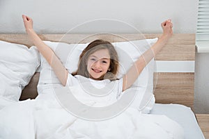 Girl Waking Up From Bed