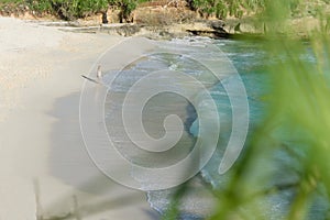 A girl walking along dream beach at sunset on Nusa lembongan,bali,indonesia 2