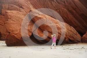 Girl Walking On Beach