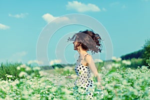 Girl walking on the buckwheat field