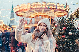 Girl walking on Christmas Market on Red Square in Moscow