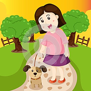 Girl walking dog in the park