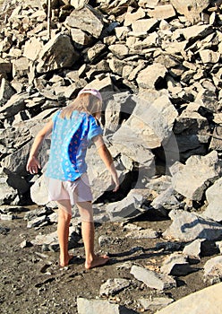 Girl walking in mud