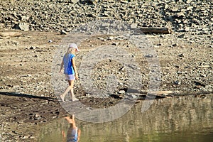 Girl walking in mud