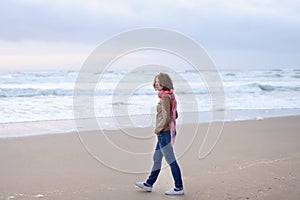 Girl walking near ocean