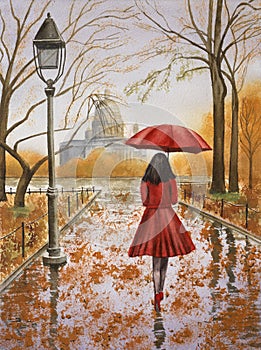 Girl walking in a rainy day