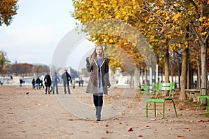 Girl walking in the Tuilleries garden photo