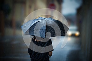 Girl walking with umbrella