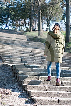 Girl walking up the stairs