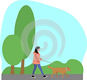 A girl walks in the Park with a dog