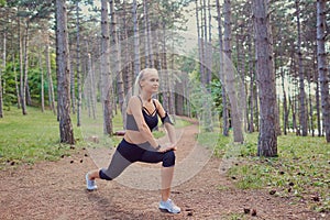 Girl warm up in forest.