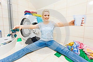 Girl wash laundry with different detergent