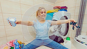 Girl wash laundry with different detergent