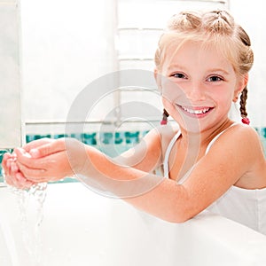 Girl washing in bath