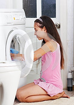 The girl is washing clothes