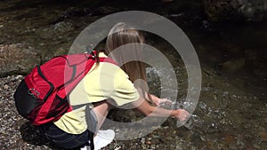 Girl Washing Hands in River Water, Kid Playing in Spring Waterfall, Tourist Child Hiking at Camping in Mountains, Trip, Excursion