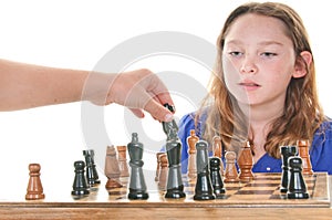 Girl watching next chess move