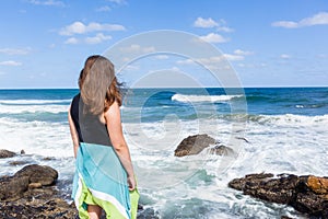 Girl Watching Ocean Waves