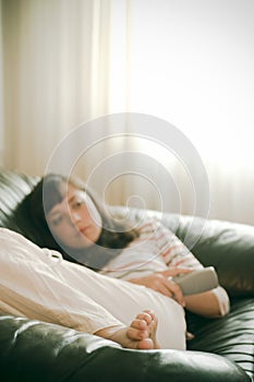 Girl watching TV photo